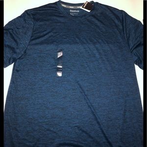 Brand new blue Reebok shirt